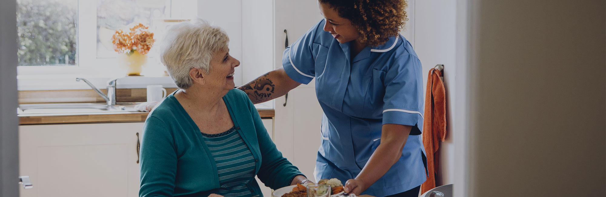 Care home worker with female resident